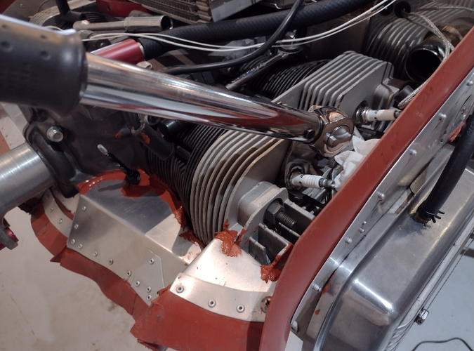 plug torque wrench extension in use.png